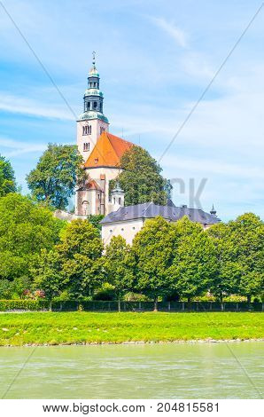 Austria Salzburg view of the Hullner church on the Salzach river bank