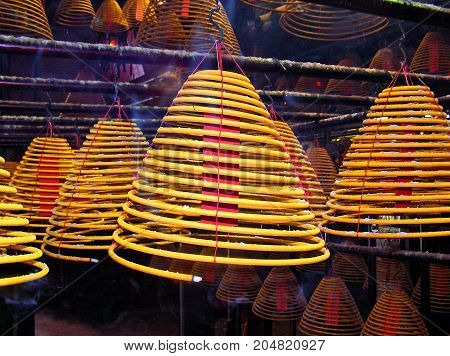 Huge incense sticks in a Buddhist temple