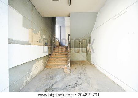 Deserted room and staircase in ancient building