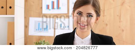 Beautiful Businesswoman Sit At Workplace In Office Work With Papers