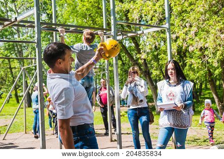 The Athlete Does Exercises During A Public Open Competition For Doing Standards Trp In Kirov City In