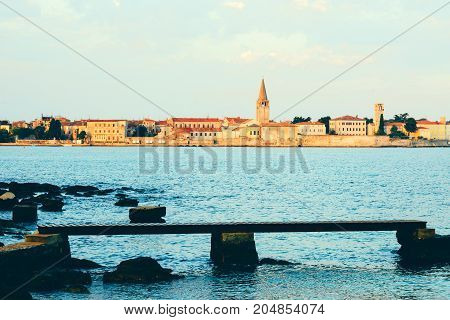 Summer holiday by the sea. Sunset on the seashore. City View Walk along the seafront