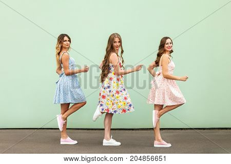 Young Adult Womans Walking To The Mall.