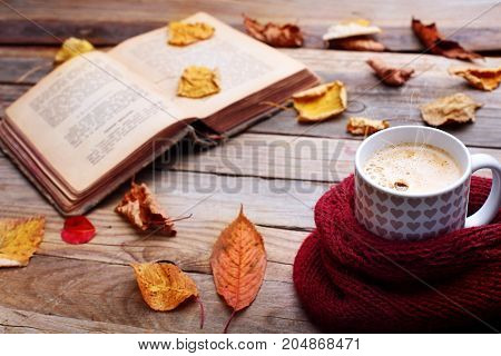 Cup Hot Cappuccino Coffee On Wooden Table With Autumn Leaves ,book.autumn Concept.warm Autumn Pictur