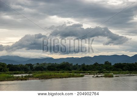 Landscape of river and mountain in rural of Thailand
