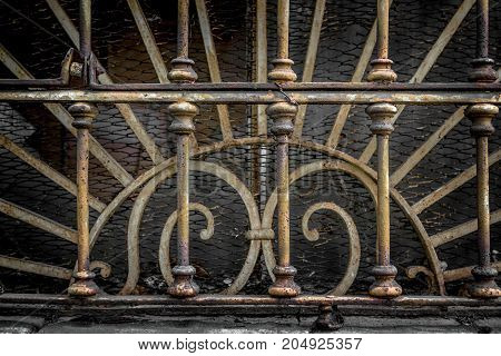 Decorations end 800 of an old Italian industrial railing.