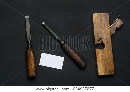joiner tools on dark wooden table background.