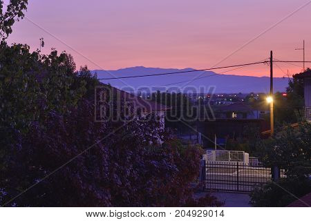 Sunset over mountains from the village Nea Pella in the North of Greece.