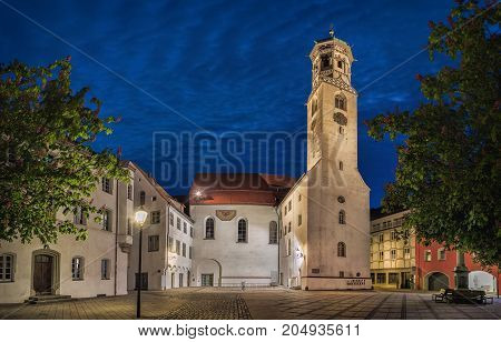The former church of St. Peter and Paul also called Kreuzherrenkirche at dusk in Memmingen Bavaria