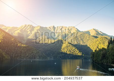 The beautiful lake ritsa in Abkhazia. Landscape of the mountains of the forest and the lake