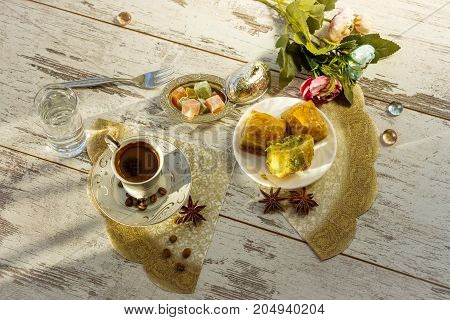 Cup Of Turkish Coffee And Plate With Baklava Top View