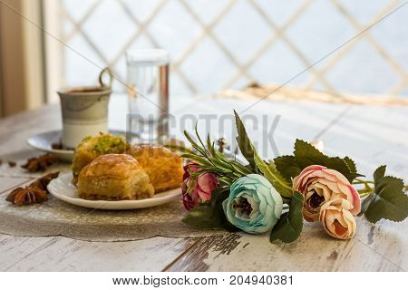 Cup Of Turkish Coffee And Plate With Baklava