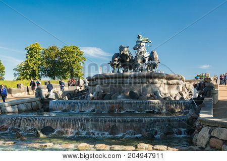 Copenhagen Denmark - september 3 2017: The Gefion Fountain is a large fountain on the harbour front in Copenhagen. It features a group of animal figures being driven by the Norse goddess Gefjon.