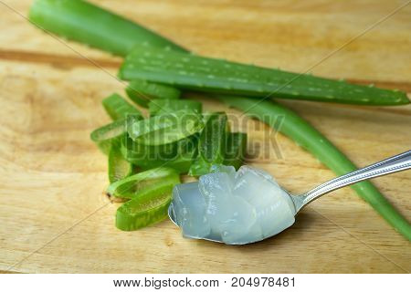 Aloe Vera Gel Almost Use In Food Medicine And Beauty Industry. Spoonful Of Aloe Vera Gel Cut In Cube