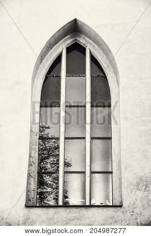 Old window with reflections Spilberk castle Brno southern Moravia Czech republic. Architectural element. Black and white photo.