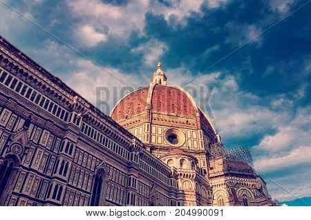 Duomo Santa Maria del Fiore roman catholic church building at sunset in Florence Italy gothic style architecture closeup