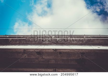 road bridge and blue sky with clouds
