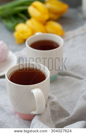 A Tasty Snack: Two Cups Of Tea, And Plate Of Zephyr.