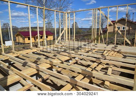 Construction Home Framing Against Blue Sky.wood Frame Residential Building Under Construction.buildi