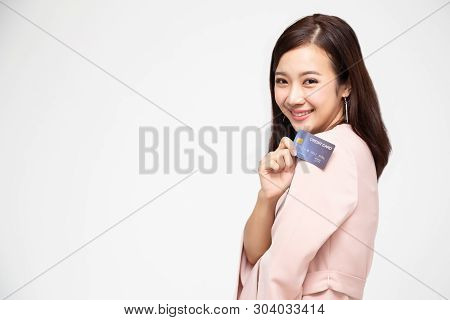 Happy Asian Woman Holding Credit Card Or Cash Advances, Pay Instead Of Money And Specially Curated B