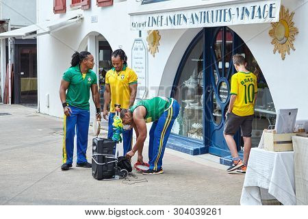Saint-jean-de-luz, France - June 22, 2018: Merry Fans Of The Brazilian Soccer Team Staged A Musical 