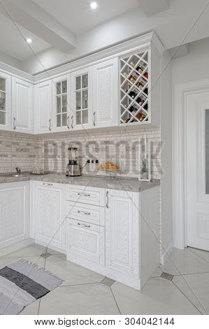 interior of modern white wooden kitchen in luxury home