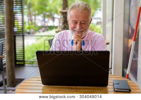 Handsome Senior Tourist Man Exploring The City Of Bangkok, Thail