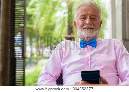 Handsome Senior Tourist Man Exploring The City Of Bangkok, Thail