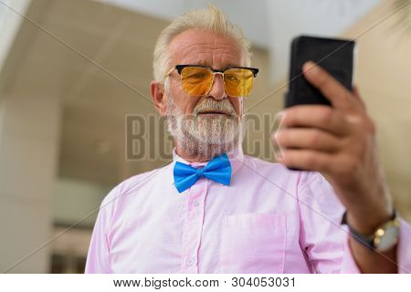 Handsome Senior Tourist Man Exploring The City Of Bangkok, Thail
