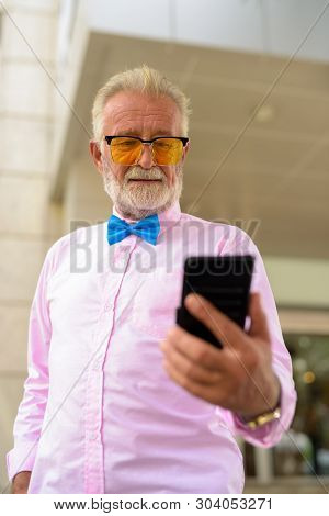 Handsome Senior Tourist Man Exploring The City Of Bangkok, Thail