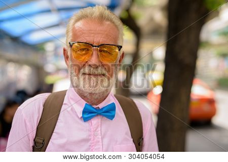 Handsome Senior Tourist Man Exploring The City Of Bangkok, Thail