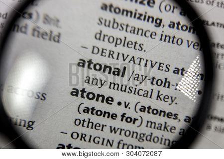 The Word Or Phrase Atonal In A Dictionary Book.