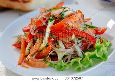 Vegetable Salad On The White Plate, Great Image For Your Needs. Achik Chukchuk Salad With Tomatoes A