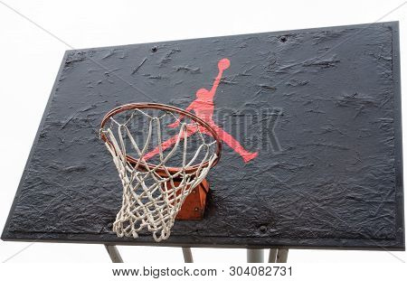 Kyiv, Ukraine -  April 21, 2016: Jumpman Logo By Nike Painted On The Black Backboard Of The Old Bask
