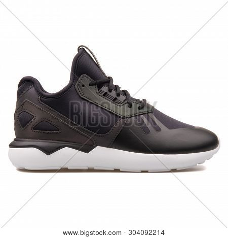 Vienna, Austria - August 10, 2017: Adidas Tubular Runner Xenopeltis Black Sneaker On White Backgroun