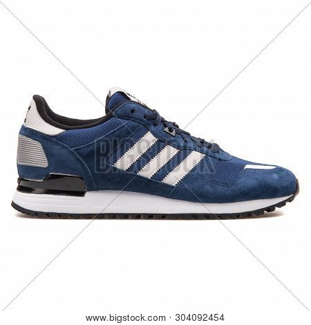 Vienna, Austria - August 10, 2017: Adidas Zx 700 Navy Blue Sneaker On White Background.