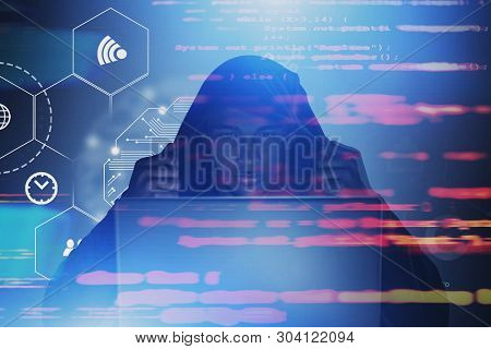 Serious African American Hacker In Hoodie Looking At Laptop. Double Exposure Of Online Security Inte