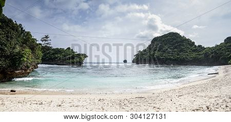 Beautiful Sea Wave At Tiga Warna Beach In Malang, East Java, Indonesia. Beautiful Beach Landscape.