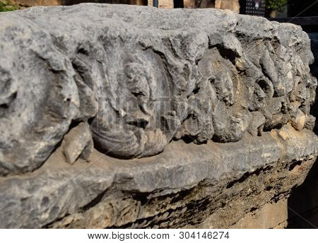 The Element Of The Gate Of Hadrian On The Ground Near The Gate. Ruins Of Ancient Construction. Hadri