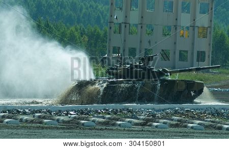 Nizhniy Tagil, Russia - July 12. 2008: Modernized Tank T-80 Moves After Overcoming Of Water Of 1.5 M