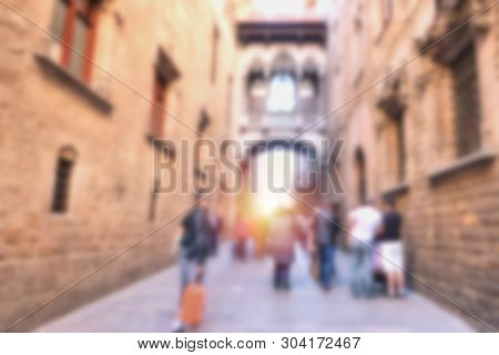 Abstract Blurred Background Image Of People Walking On A Street Along Ancient Vintage Architecture I