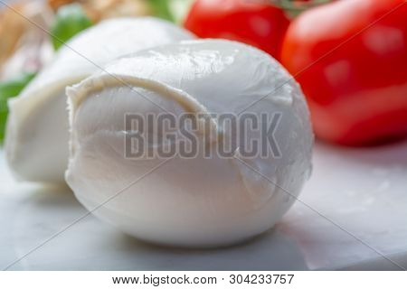 Balls Of Buffalo Mozzarella, Soft Italian Scheese Made From The Milk Of Italian Mediterranean Buffal