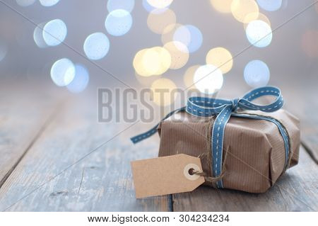 Gift Box Wrapped With Ribbon With Blank Card