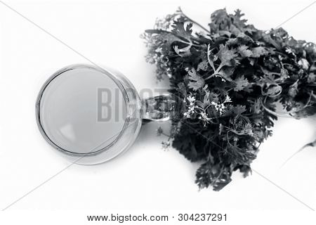 Fresh Parsley Juice  Or Coriander Juice In A Transparent Glass Isolated On White With Fresh Parsley