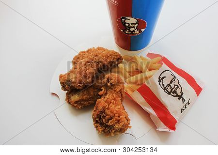 Moscow, Russia - May 2019: Kfc Combo Meal With Hot Chicken Wings, Fries And Soda