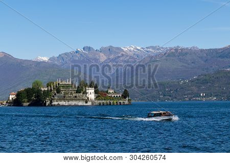 Panoramic View Of Boat And Island In Northern Italy Lakes Area