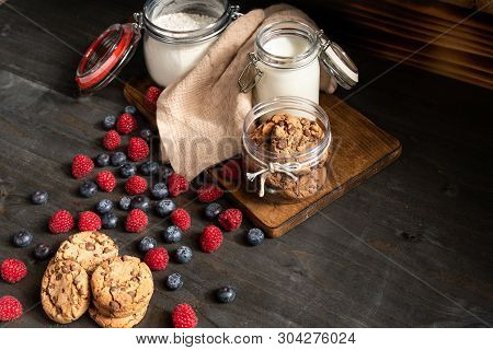 Biscuits, Raspberries And Milk Jar, With Copyspace On Right Side