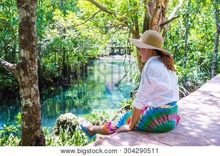 Asian Women Travel Relax, Travel Nature In The Holiday. Nature Study In The Forest. Women Happy Enjo