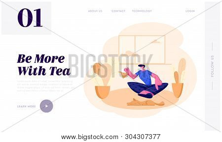 Young Man Sitting On Floor With Tea Pot In Hands At Home Interior Having Leisure, Sparetime, Relaxin