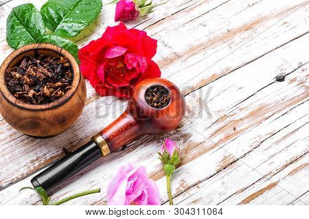 Smoking Pipe And Floral Tobacco